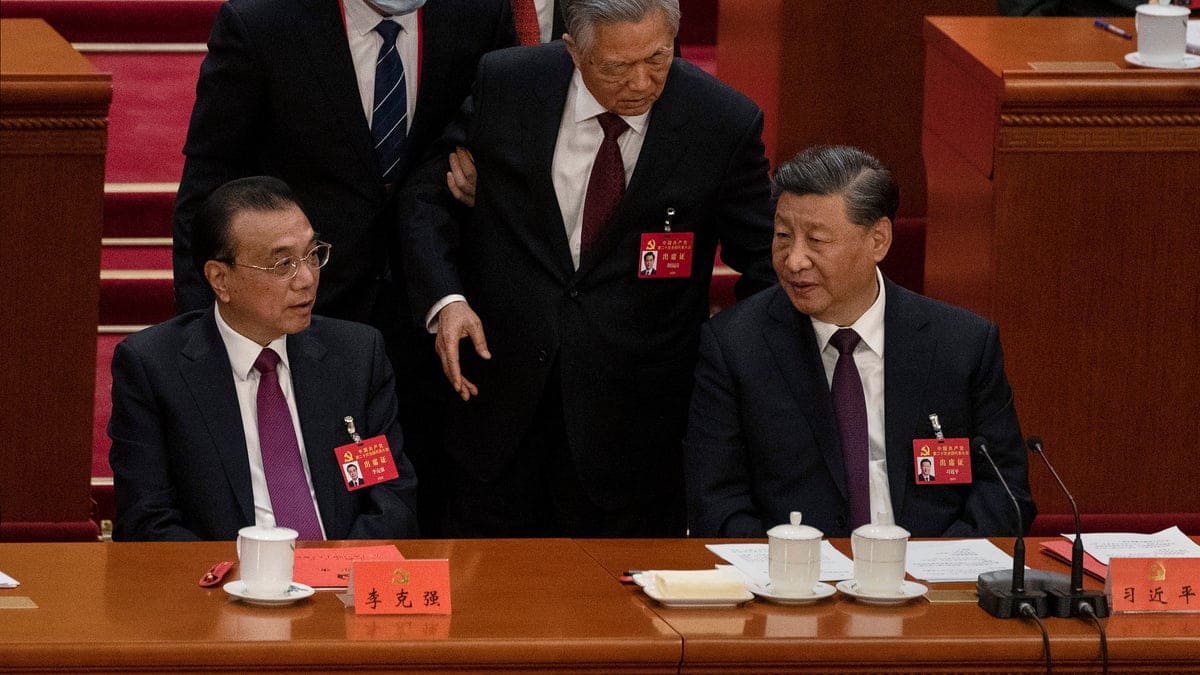 Drama at Chinese Communist Party summit Xi predecessor Hu Jintao hauled out