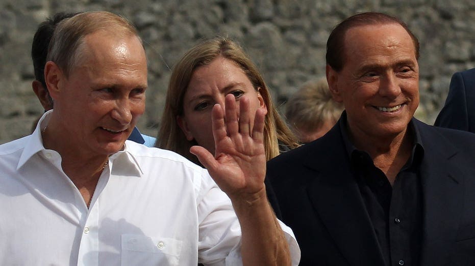 Italy's Berlusconi says Russia's Putin gave him vodka, 'sweet' note