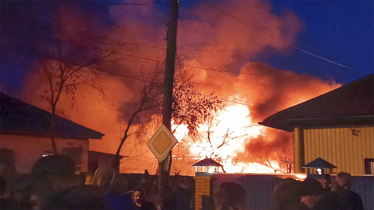 Russian fighter jet crashes into residential building in Siberian city