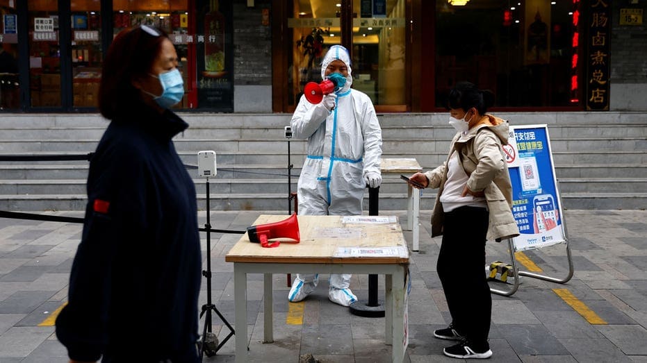 China sees spike in COVID-19 cases