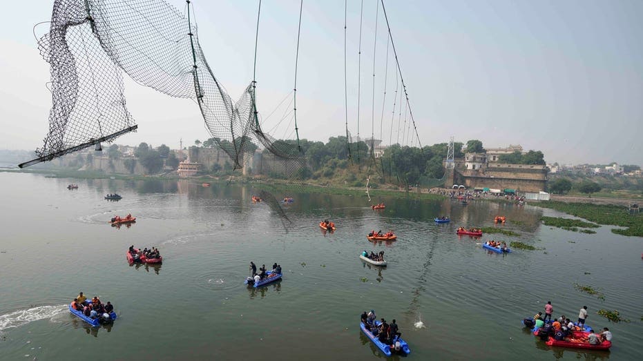 India prime minister visits site of bridge collapse as families mourn